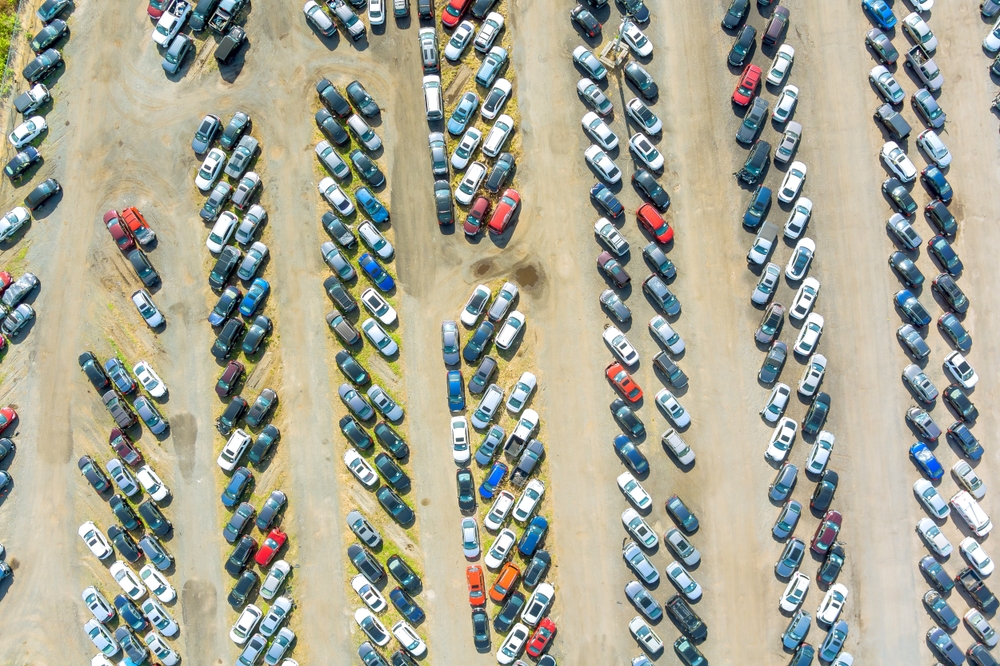 Drone view of automobile storage area managed under warehousing services in Japan
