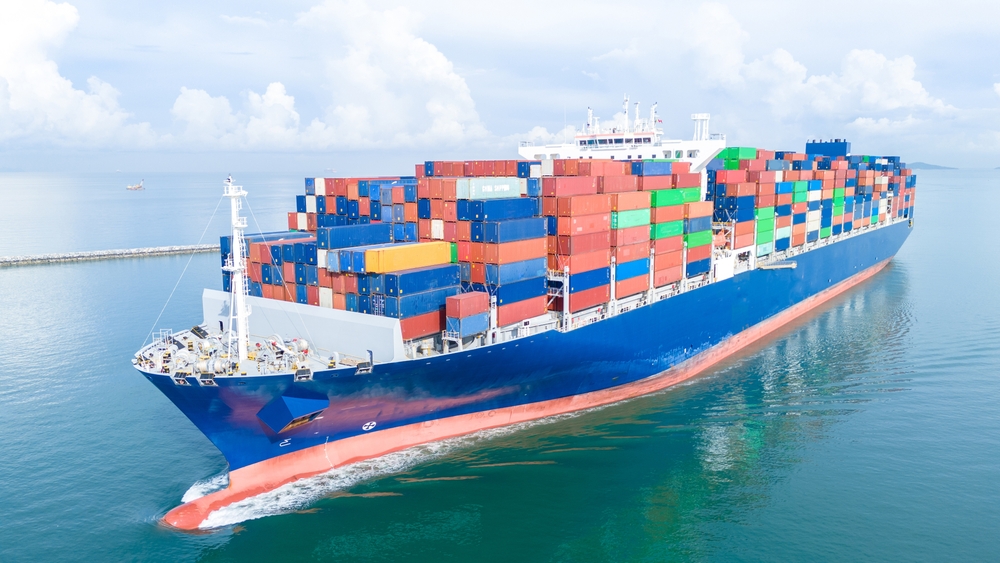 Cargo ship at sea managed by an ocean freight company in Japan.